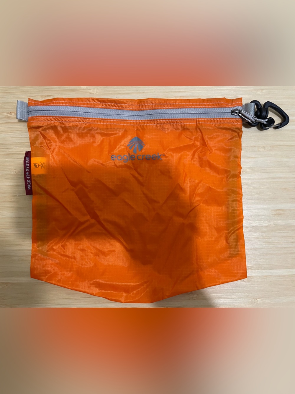 Eagle Creek Travel Pouch ~ Orange - Picture 2 of 3